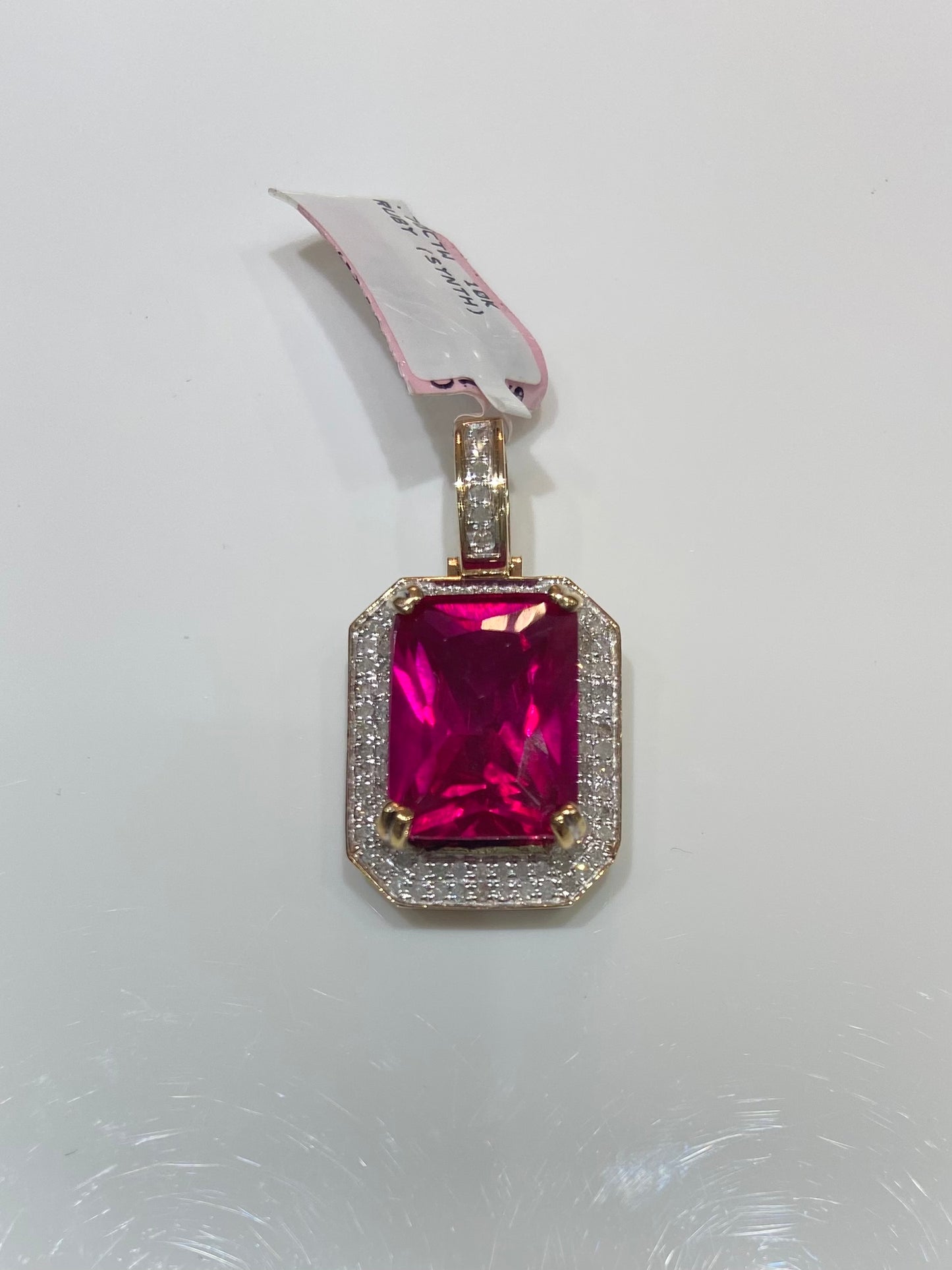 10K .70CTW Ruby Charm