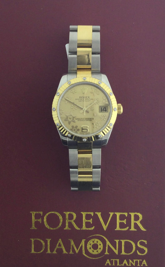 Rolex 31 MM YELLOW GOLD OYSTER