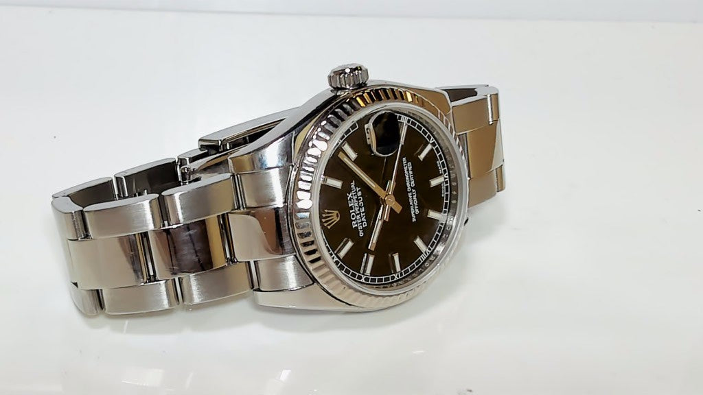**Rolex Datejust 31mm Stainless Steel Black Dial Fluted Bezel Watch**