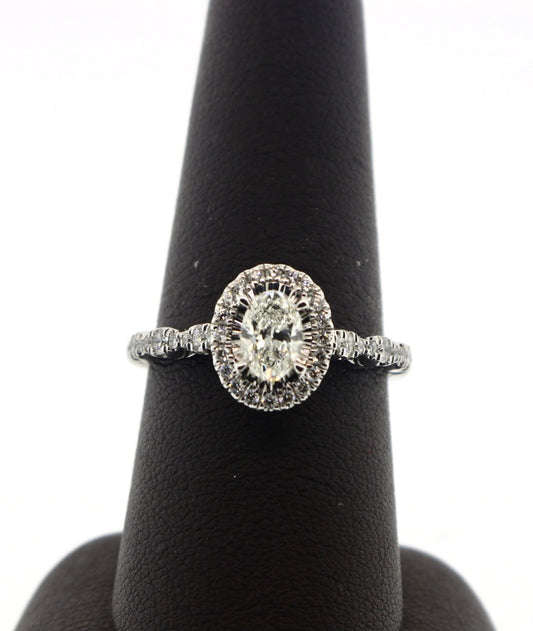 14K White Gold 0.50/0.83CTW Oval 4.4 Grams Halo Diamond Ring